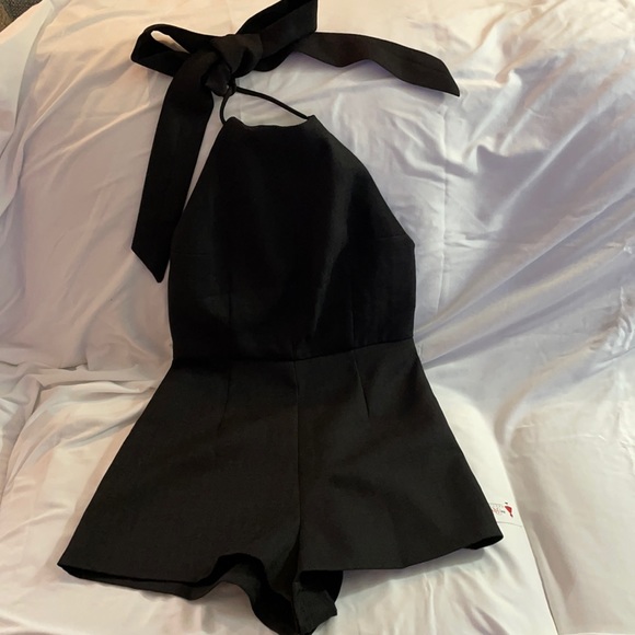 Black cocktail romper with large bow tie - Picture 1 of 5
